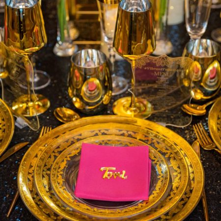 Golden cups, wine and champagne flutes
